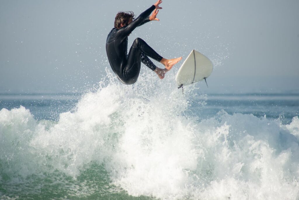 Adventure Travel Bucket List: 15 Thrilling Experiences You Must Try 6 Surfing Giant Waves in Nazarรฉ, Portugal